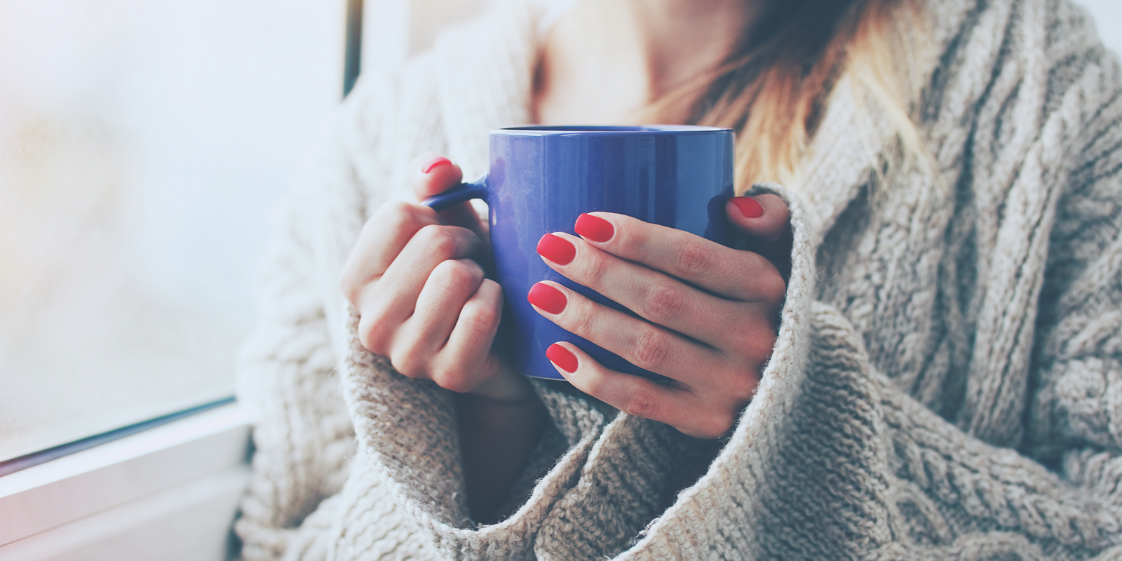 Woman drinks coffee and lemon weight loss TiKTok hack